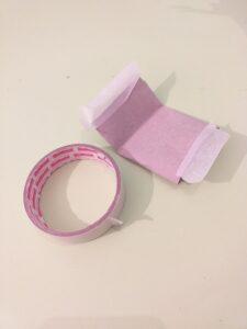 Flattened cardboard tube.