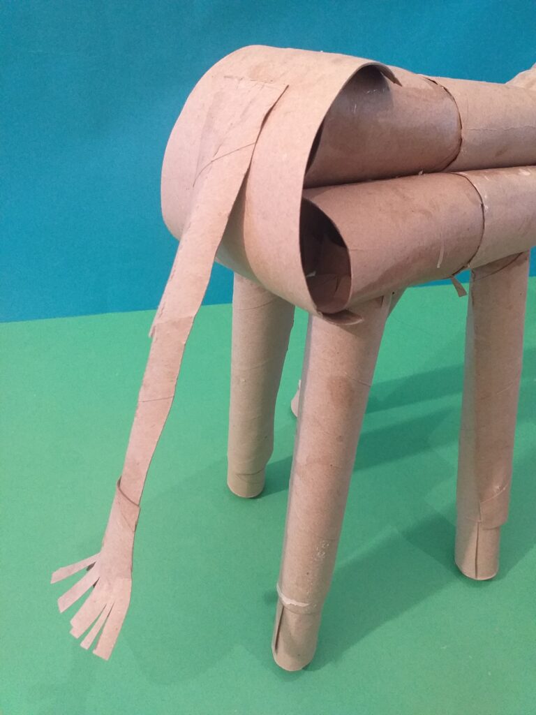 Cut tail out of long tube.