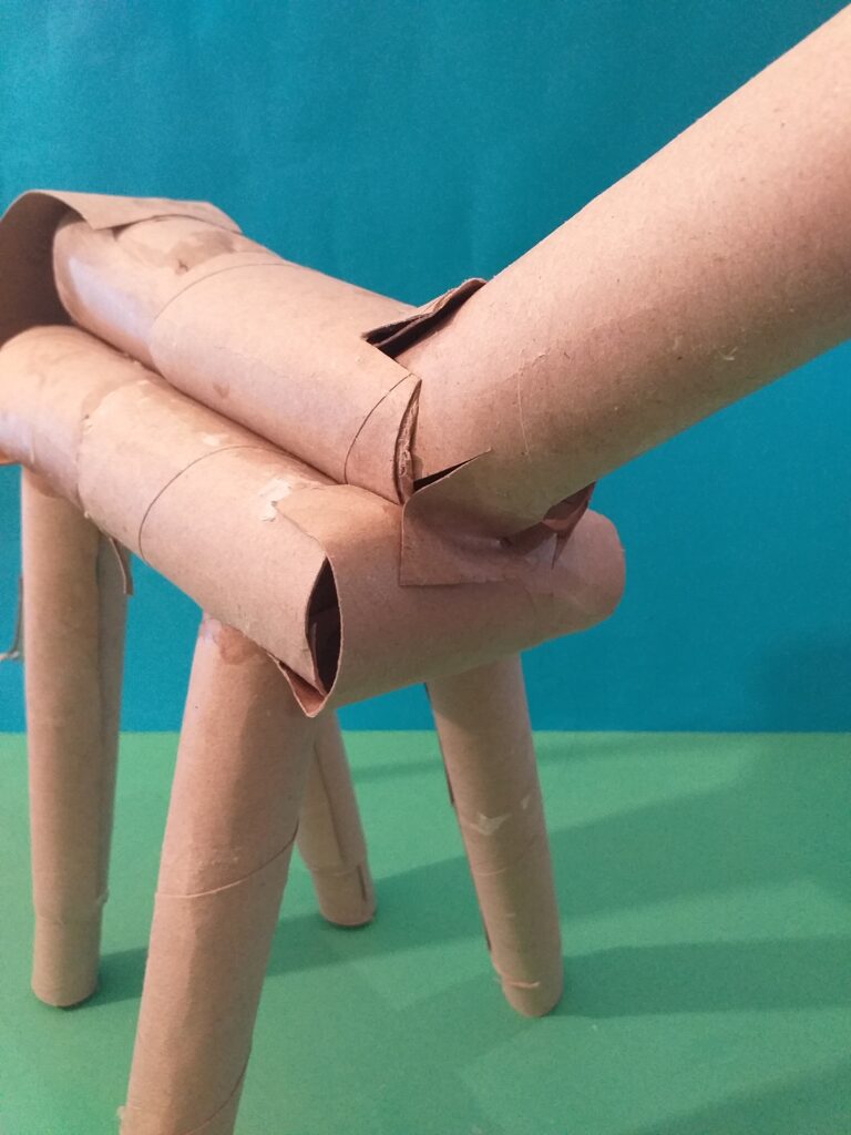 Use glue to hold in place once inserted 4 legs.