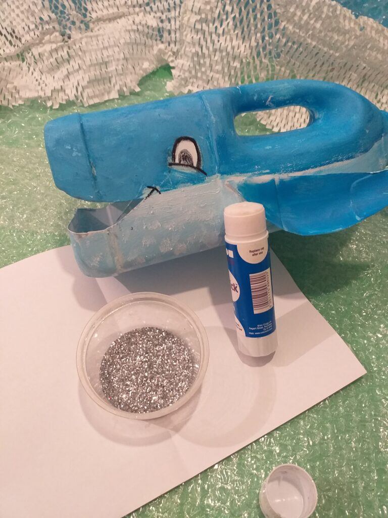 16. If you like add silver glitter use glue stick.