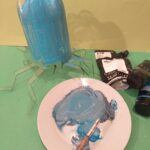 8) Now mix up your paints  blue/grey for octopus and black for a spider.