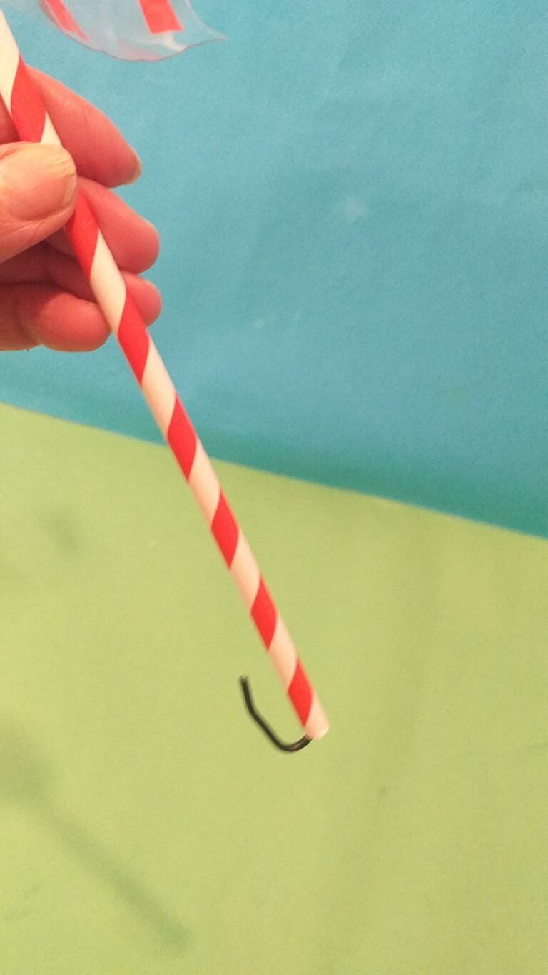 21) Run the straw up the wire and the end bit curl over so straw doesn't slide off.