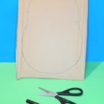 Cut cardboard into a potato shape