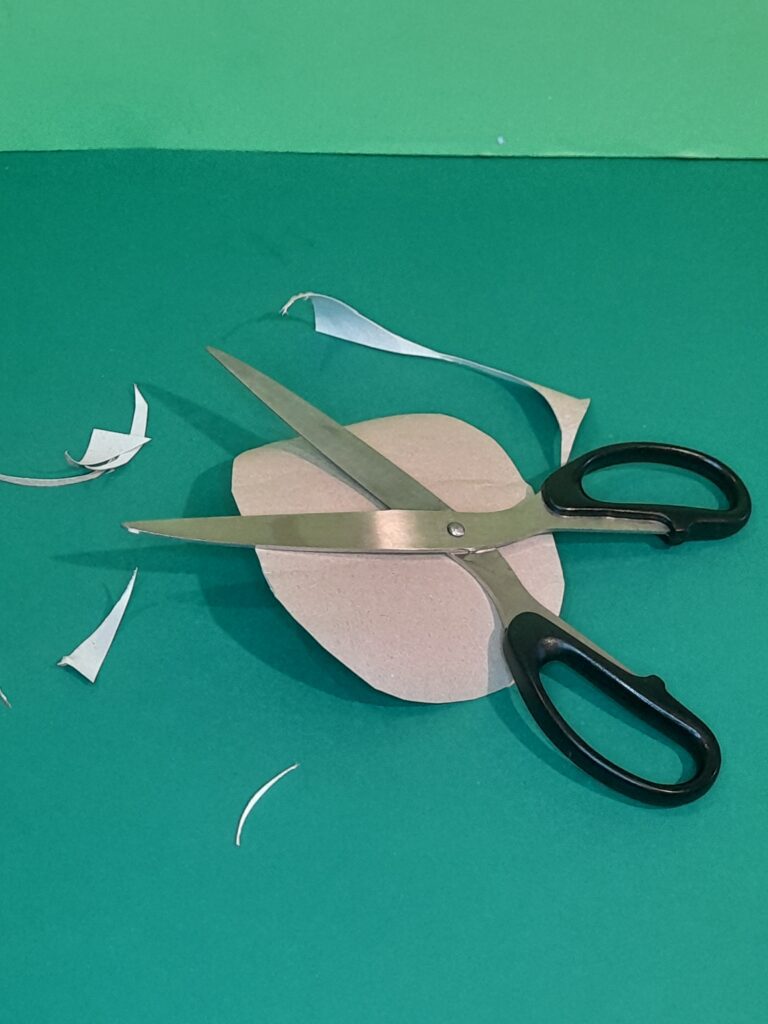 2) Now cut a circular shape from another tube.