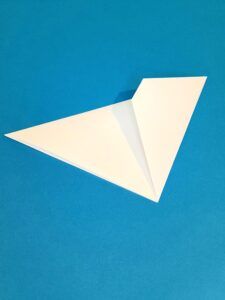 4) Fold again to make a triangle.