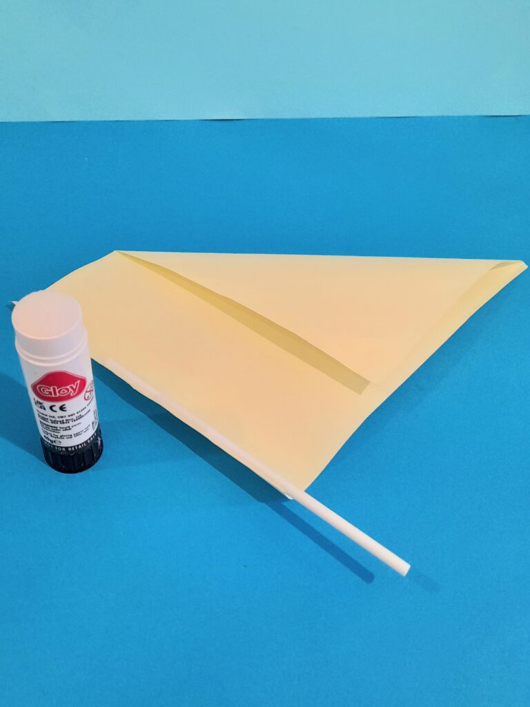 10) Run glue with glue stick along left side.