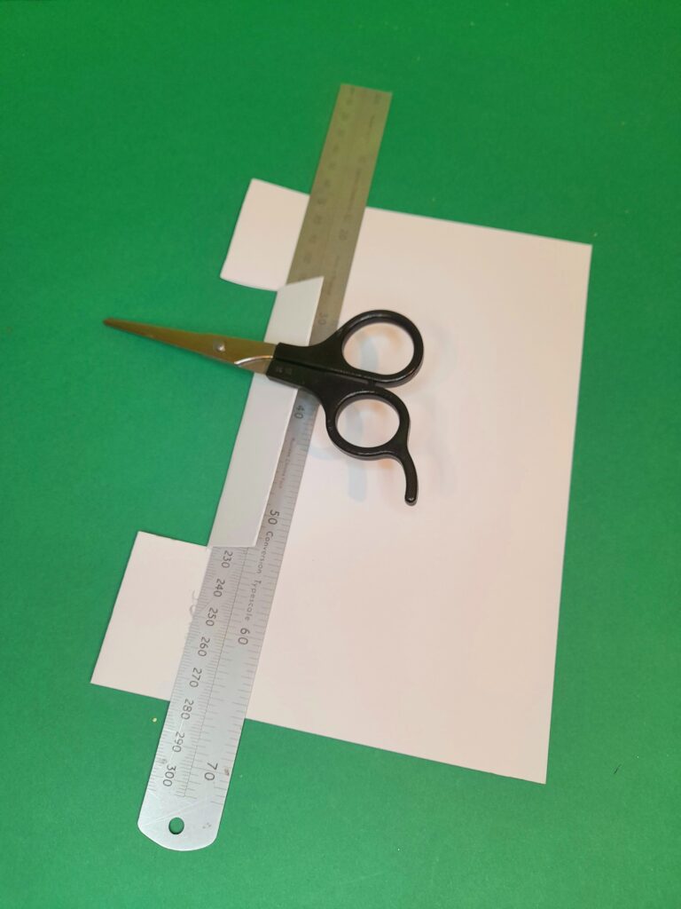 4) Snip both sides in 25mm on either side and use ruler to fold that section down.