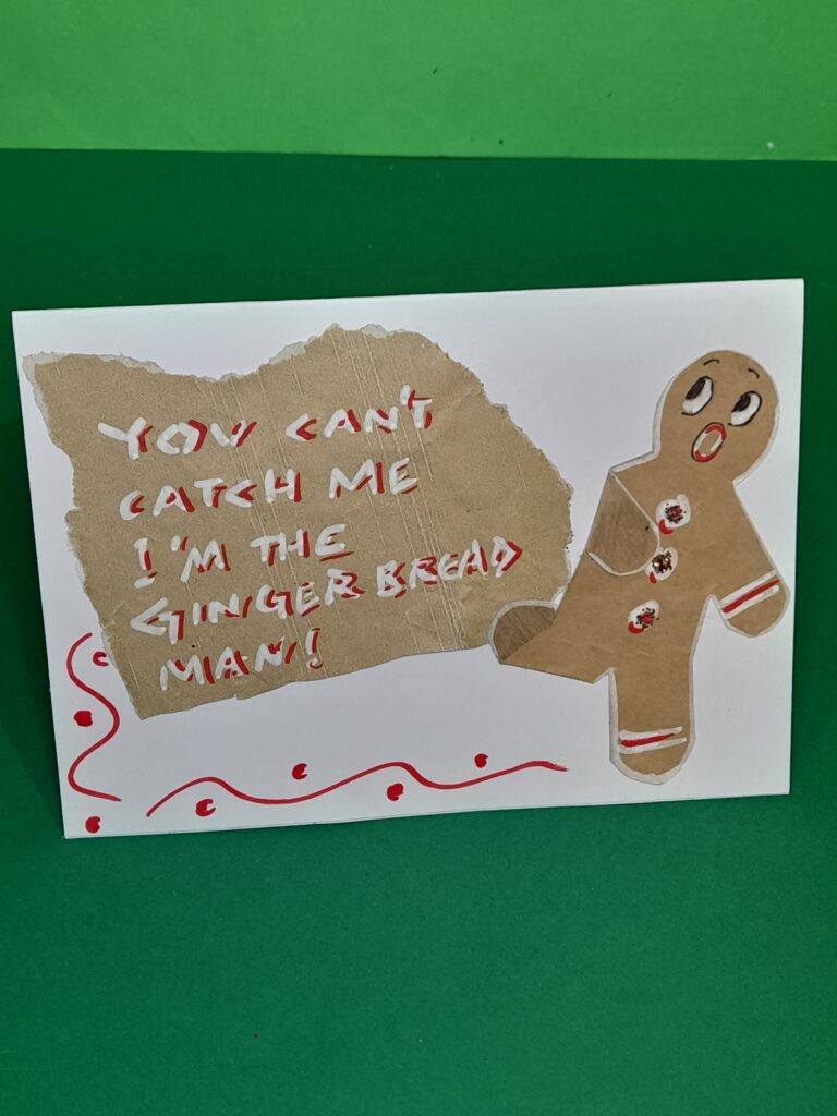 19) Finish off the card by decorating with red acrylic pen to your style.
