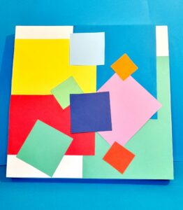 13) Design the top of lid and glue coloured shapes to dress it up.