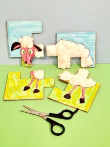8) Carefully usig a small scissors cut out the jigsaw pieces.
