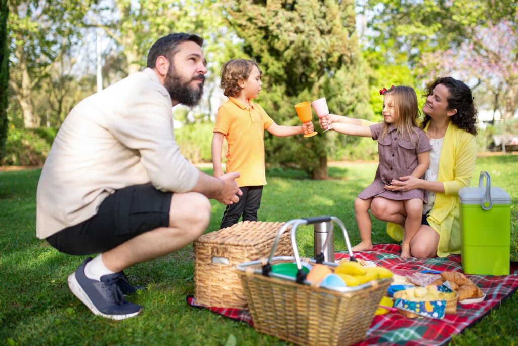 Family picnic in the park. Pexel pictur.