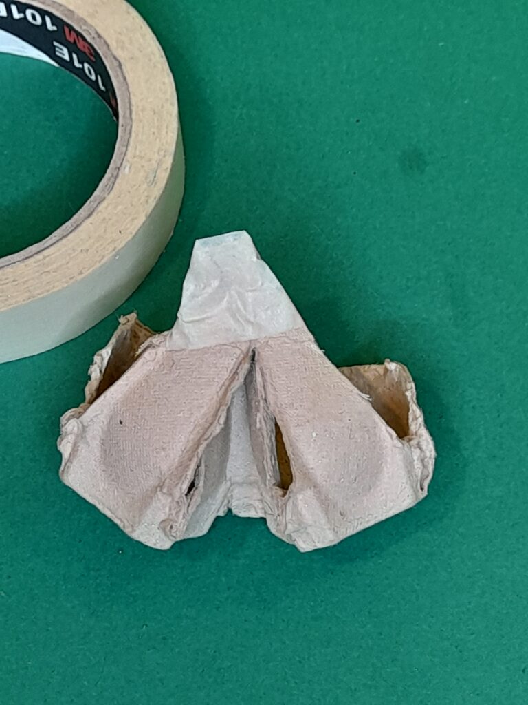 6) Tape the back end together so it holds in place.