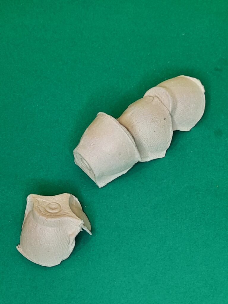 1) Cut out 3 or 4 round egg holders.