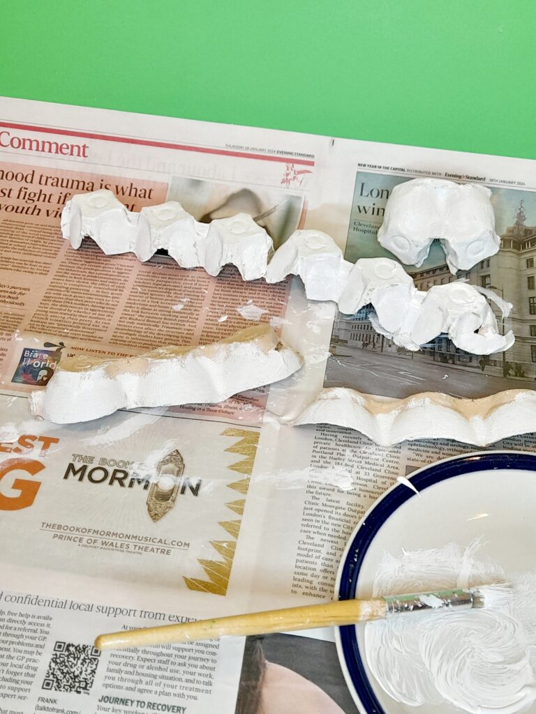 9) Now you can paint everything in white, when dry you can paint your colours.