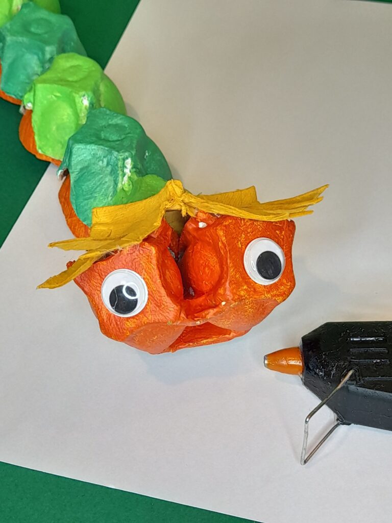 14) Now you can glue on the googly eyes.