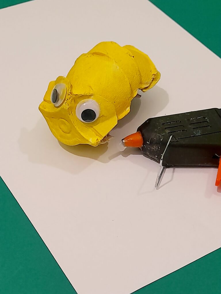 6) As you glue together form a bee body and hold until it sets.