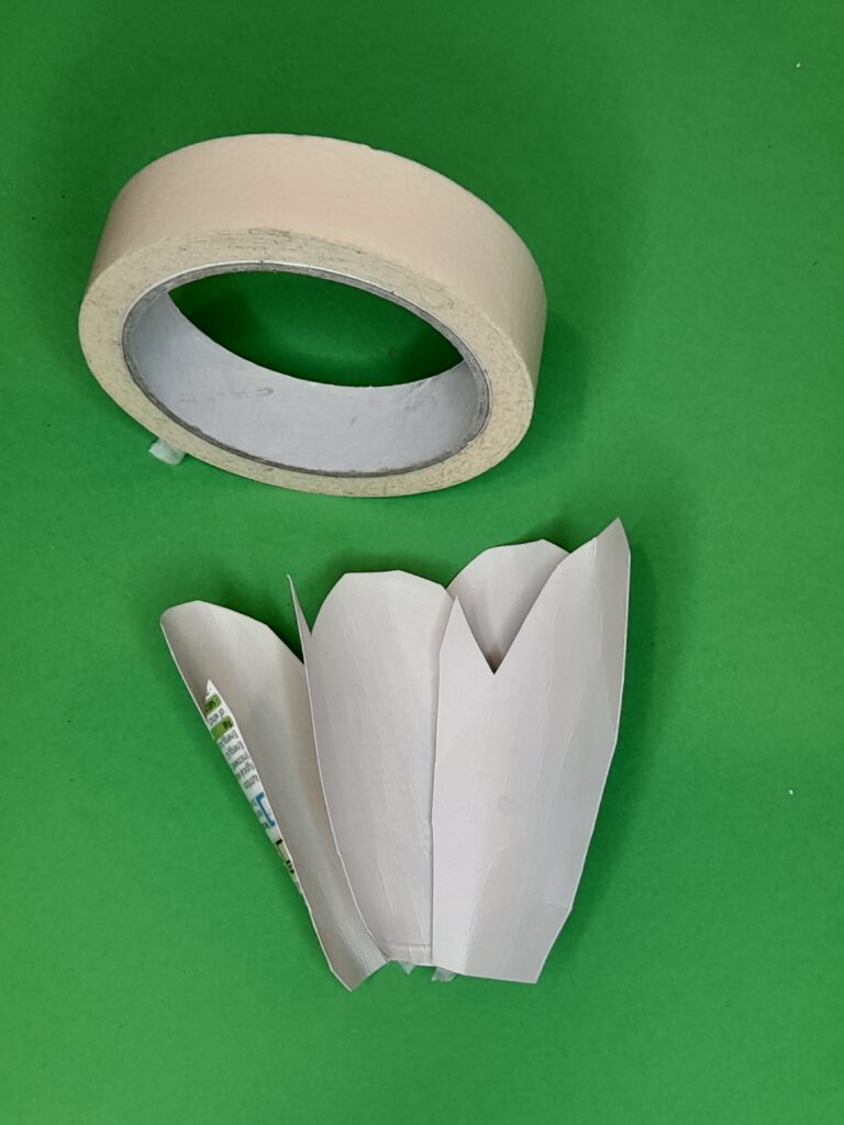 23) Twist and stick together to make a flower.