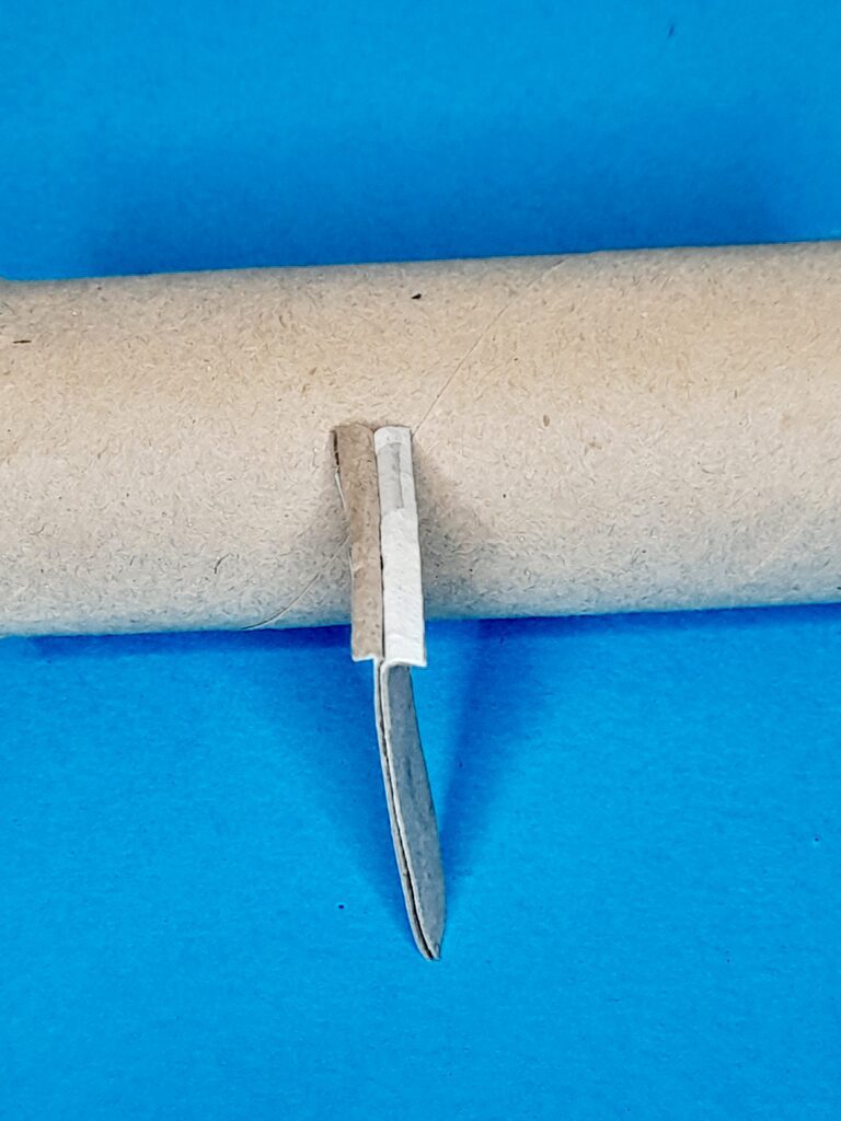 16) Glue together and fold over bottom part, then add glue or tape to hold in place.
