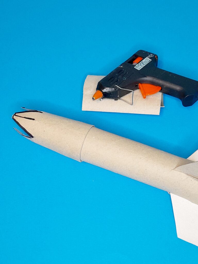 12) Slide this section onto the main body of the plane and hot glue it into place.