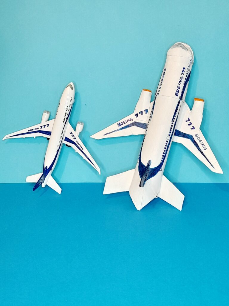 26) The model of the plane and the crafted aeroplane.