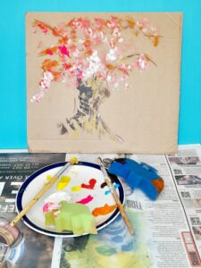 Transfer your choice of colours on to the branches of the Cherry Tree.