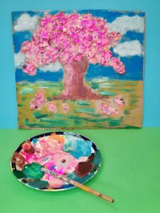 Paint the sky, and grassy area to finish of the scene.