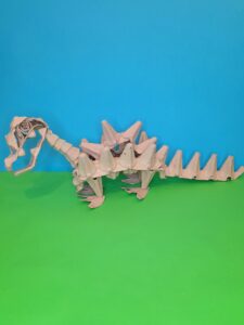 A skeleton egg box dinosaur.