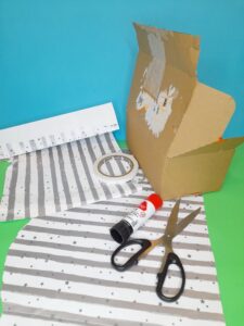 5) Prepare your chosen paper to cover the outside of the box and sides and front.