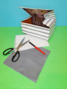 9) Take packaging foam cut to fit the base of the box.