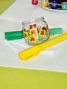 Add red smaller flowers inside the yellow flowers.