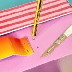 Pierce handle with knife and pencil to insert split pins.