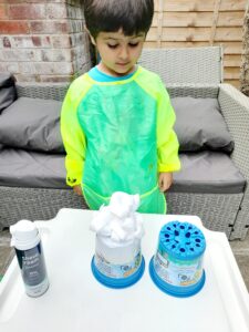 Pile the foam on top of one flower pot.