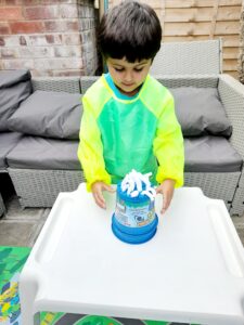 As you push pot down foamy worms flow out.