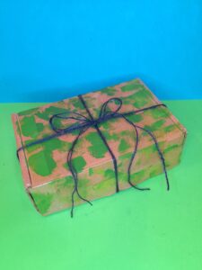 finished box tied with string