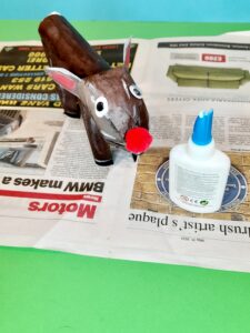 Glue on eyes and nose