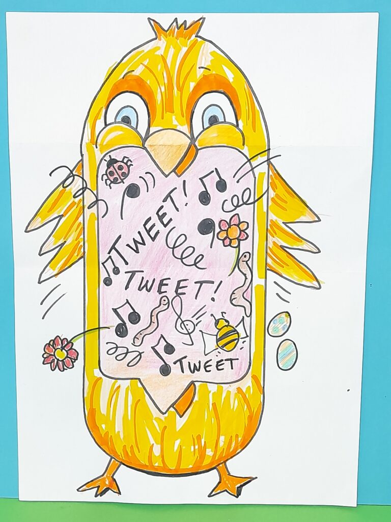 A close up of the coloured in chick.