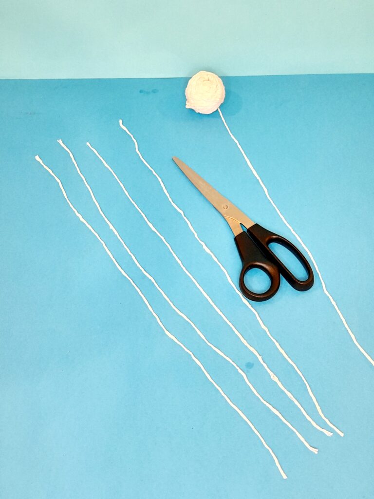 Cut 4 long strands to preferred size.