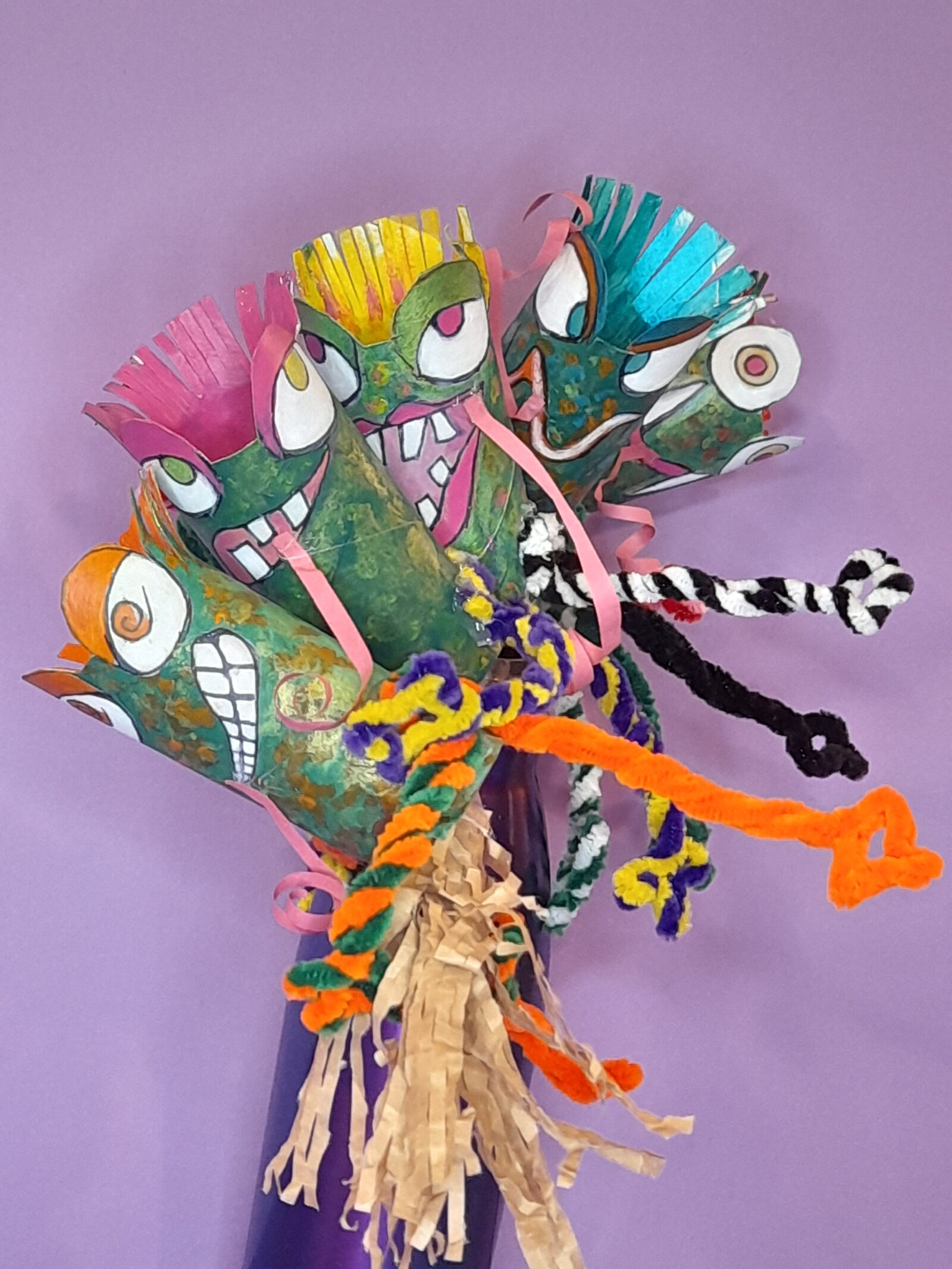 5 frogs flying on the broom.